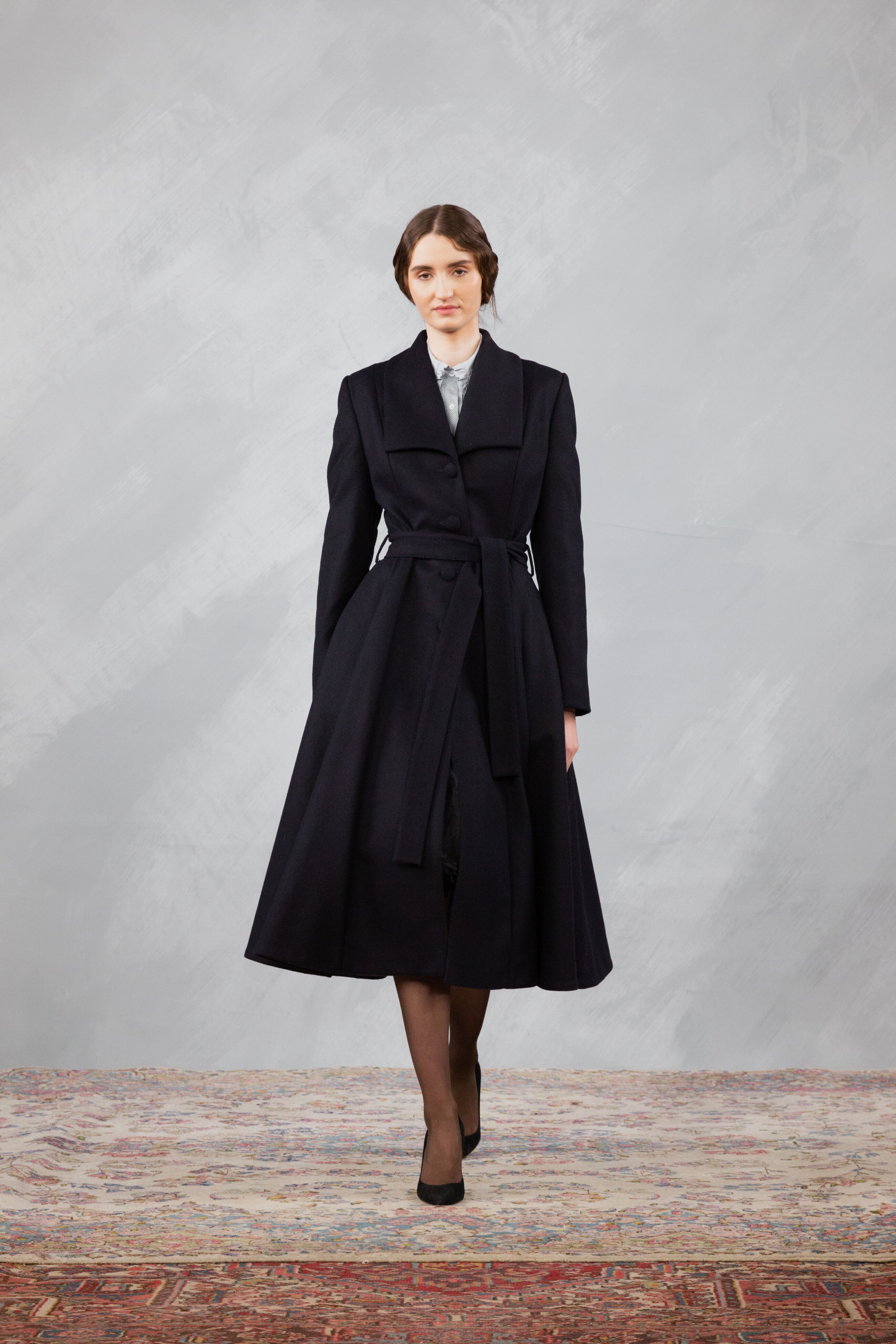 Girl in black coat online